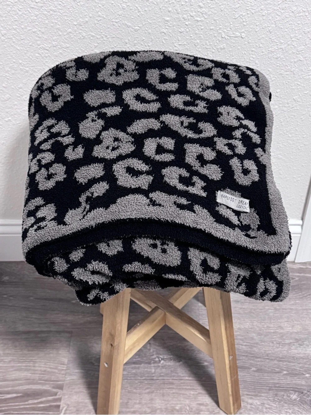 Barefoot Dreams CozyChic Barefoot in the Wild Throw Blanket in Charcoal Leopard